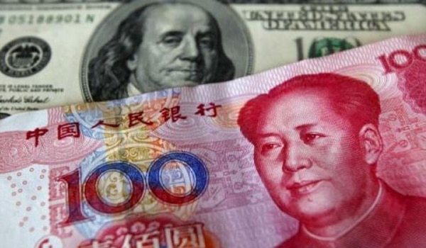 El dólar sube ante el optimismo de la Fed; el yuan cae por la crisis inmobiliaria